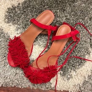 Red tassel sandals